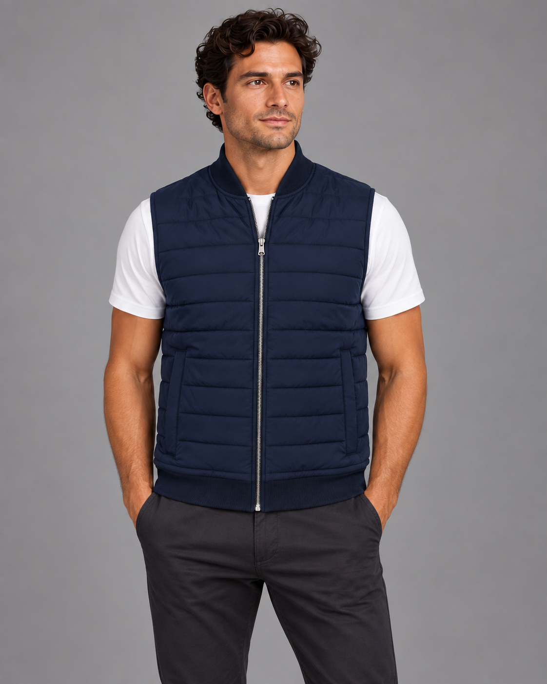 Autumn and winter layering: Carovalen navy quilted zip gilet on a model