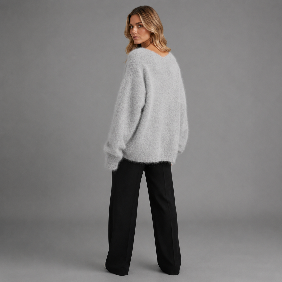 Carovalen livia soft V-neck cardigan in grey, back three-quarter studio view